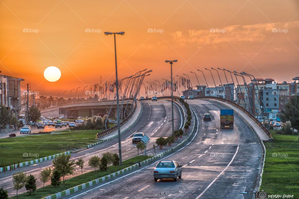 Beautiful sunset on the urban bridge