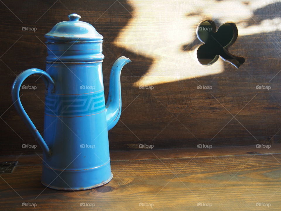 A old coffee jar on table