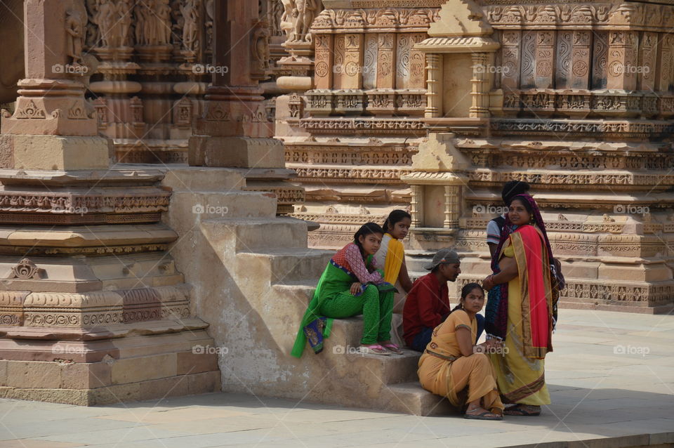 People in the shadow, Kajuraho Temples India