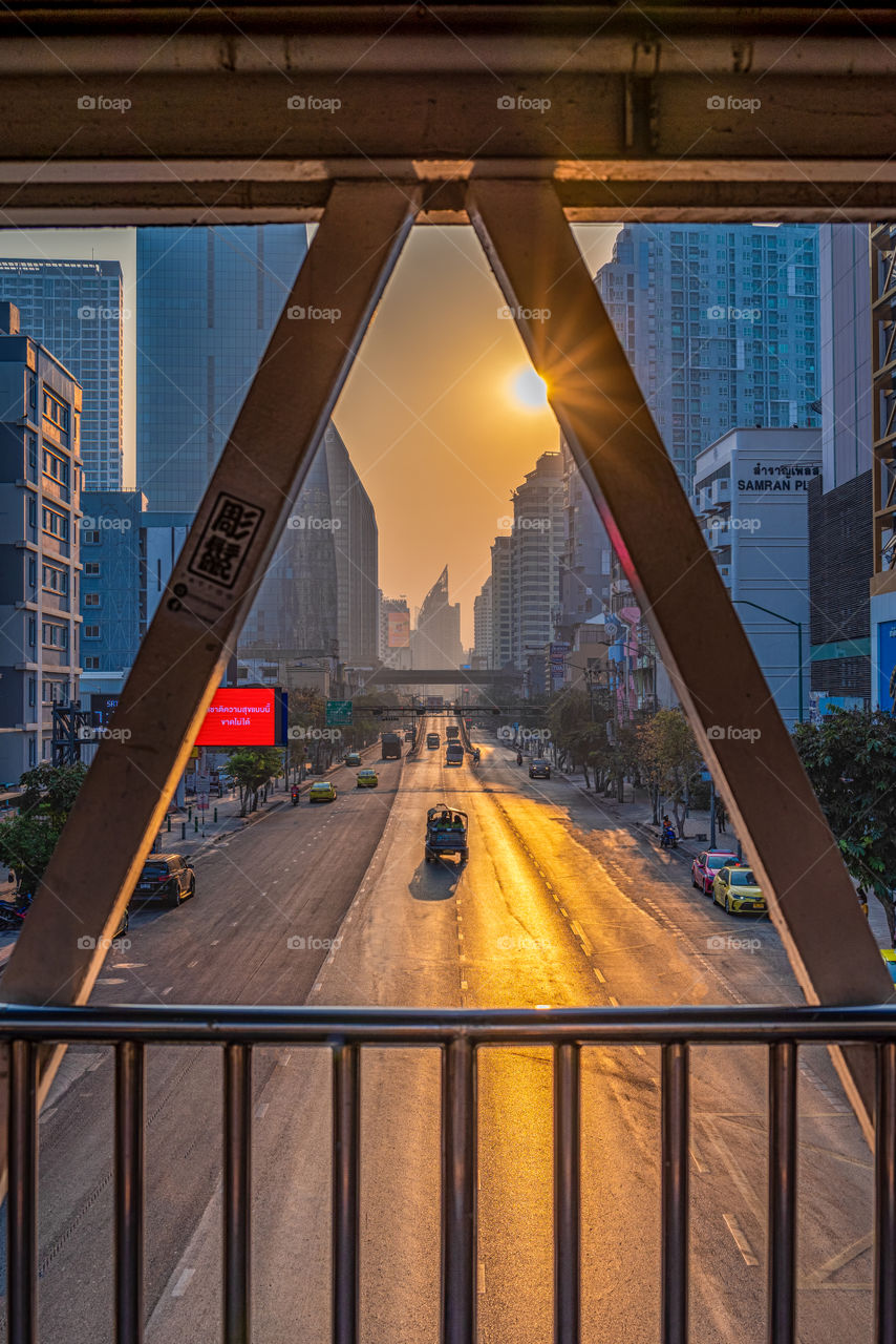 Triangle view to see tuktuk car on the road