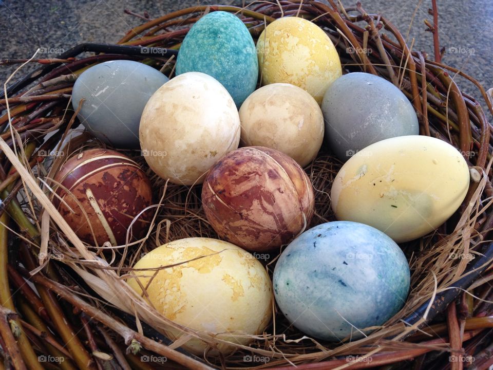 Close-up view of easter egg in a wodden basket