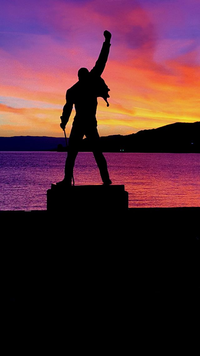 Freddie Mercury statue at sunset