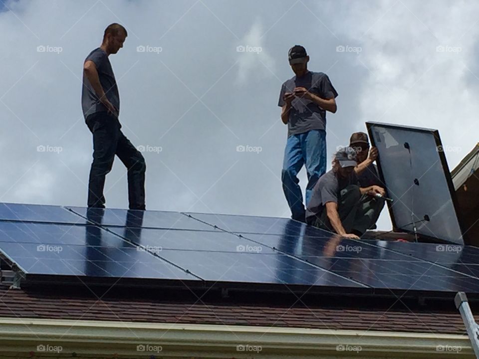 Solar Panels with Technicians 