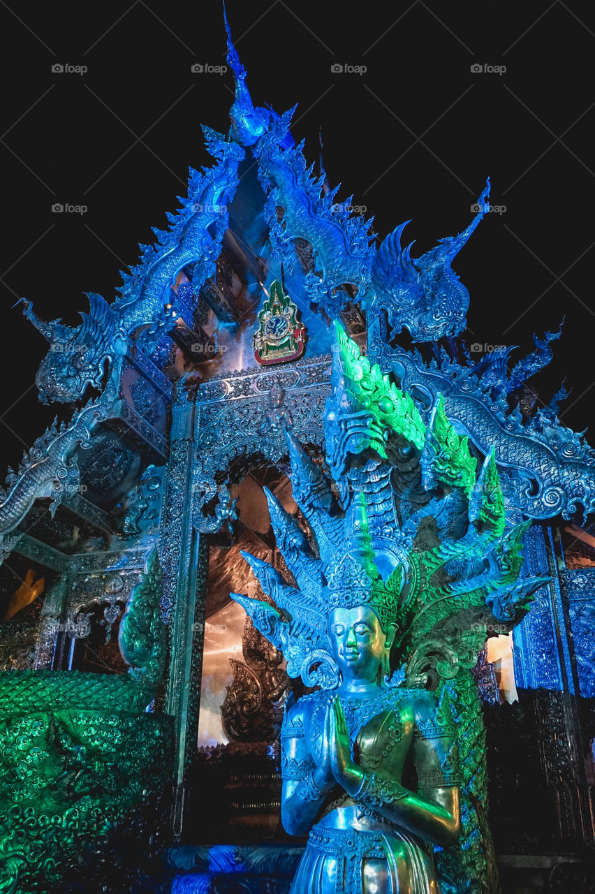 The Silver Temple in Chiang Mai, Thailand lit up beautifully at night
