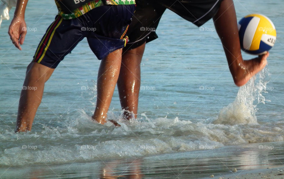 Playing football at the ko phangan beach island Thailand