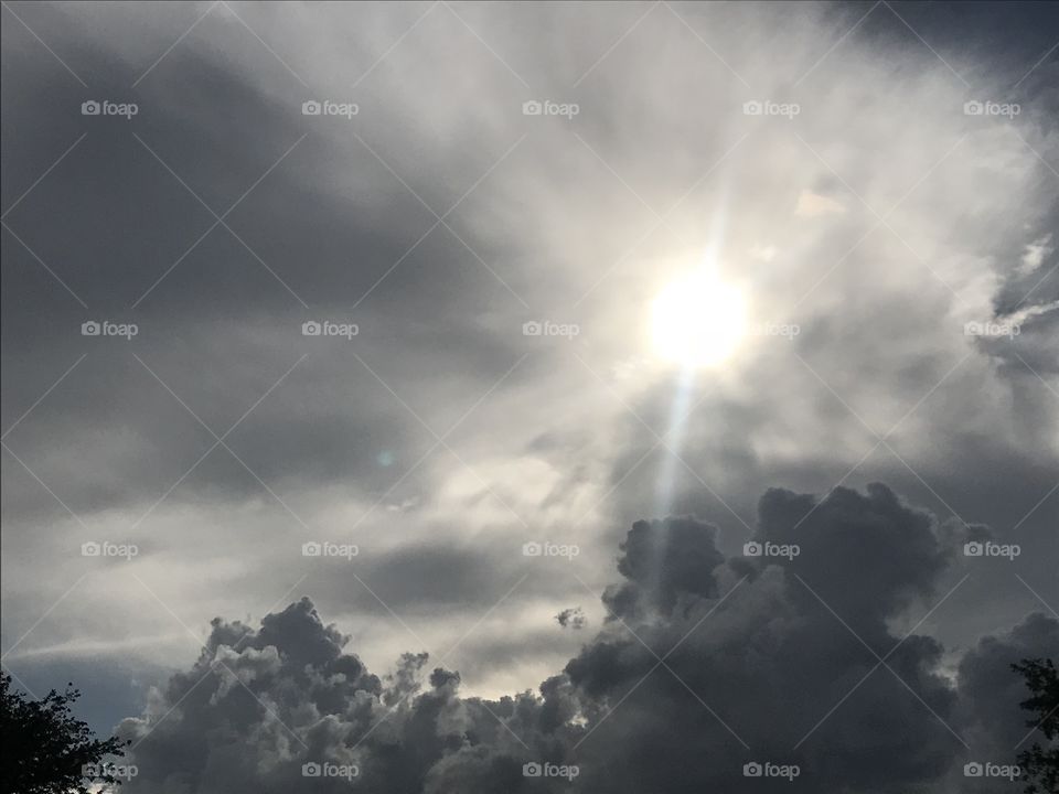 Sun under clouds 