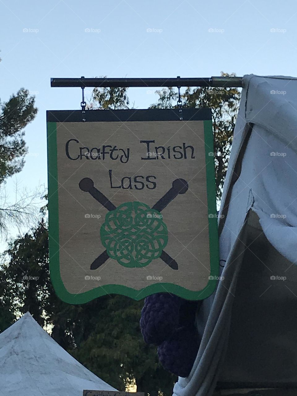 A Crafty Irish Lass sign. This represents a vendor at the Kearney Park Renaissance Faire that deals in Irish goods.