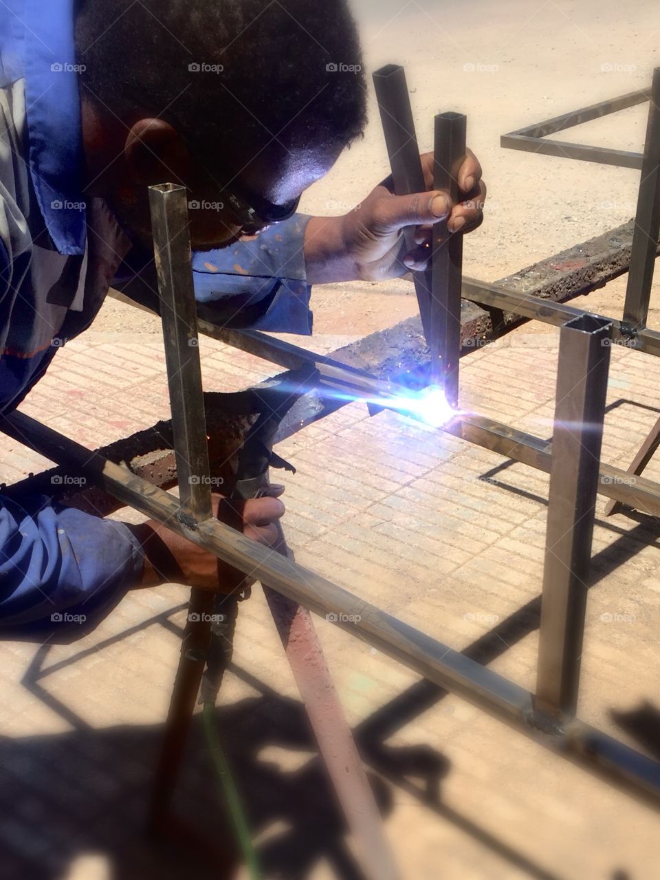 human activity.  welding