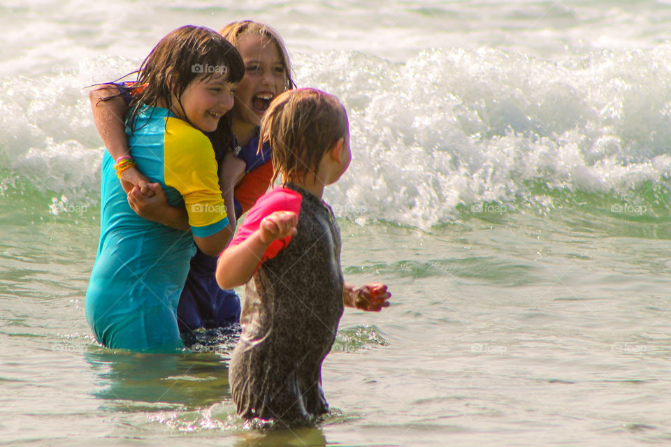 My fav moments are primarily times with my family. Some of my favourite moments involve catching photos of them playing.  We spend a great deal of time at the beach & in the water. Water play is always a priority & they love to play together!