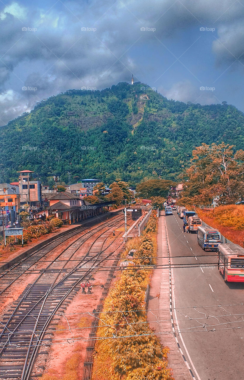 A tower in a single mountain with city view