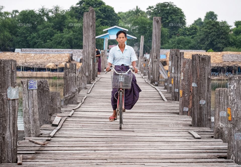 Variety Local life style on U-Bein bridge , the longest wooden bridge in the world , Mandalay Myanmar