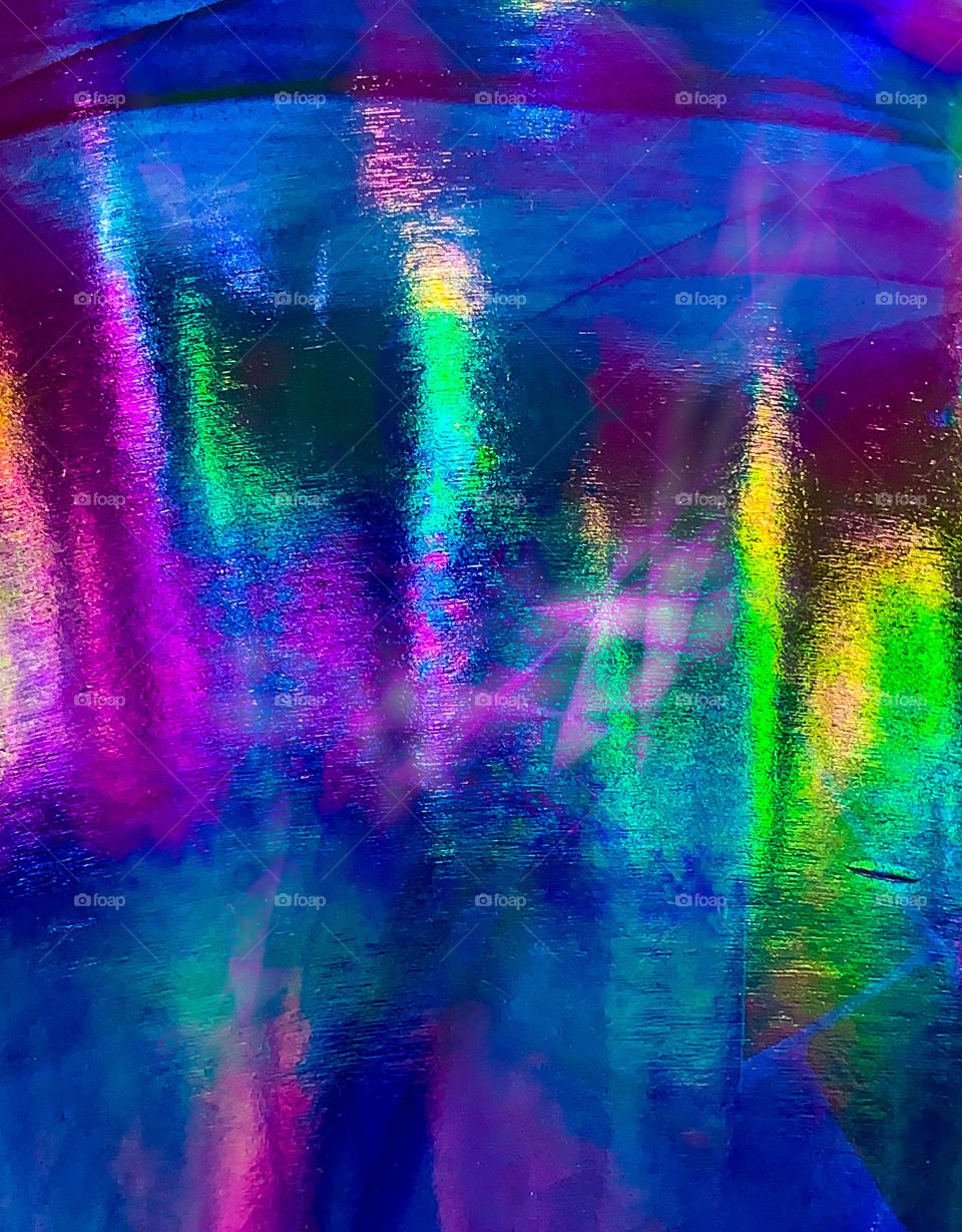 Reflection in glass bowl with rainbow of colors