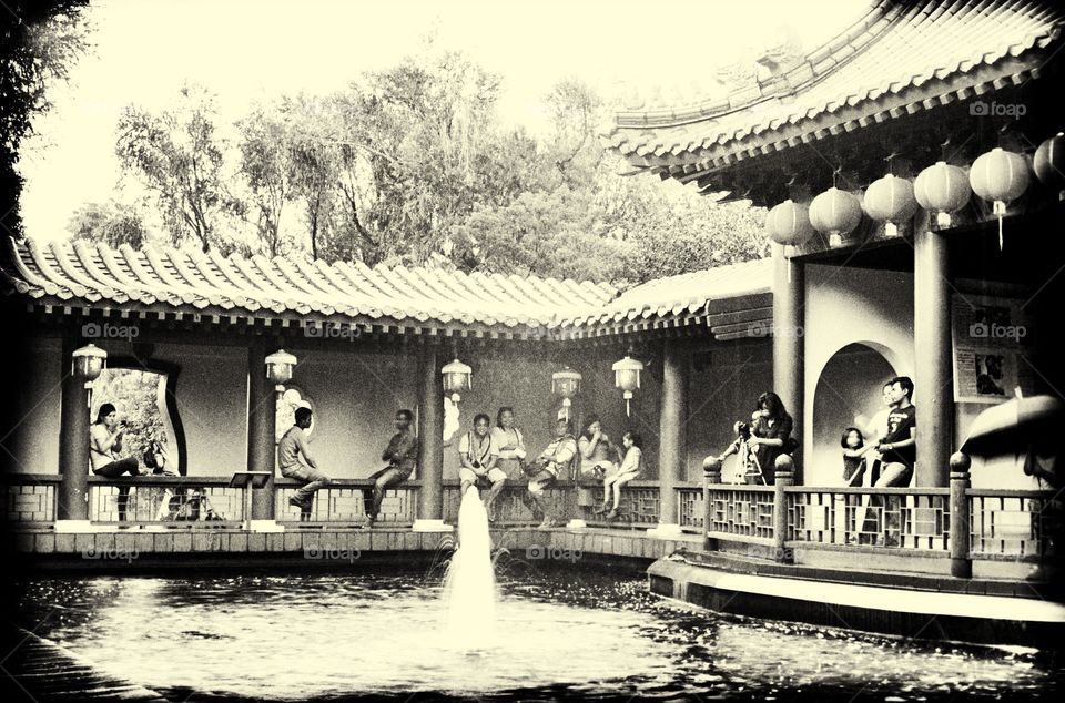 People enjoying Chinese Gardens during the week end. Singapore, March 2015.. Picture taken Kodak tx black and white film