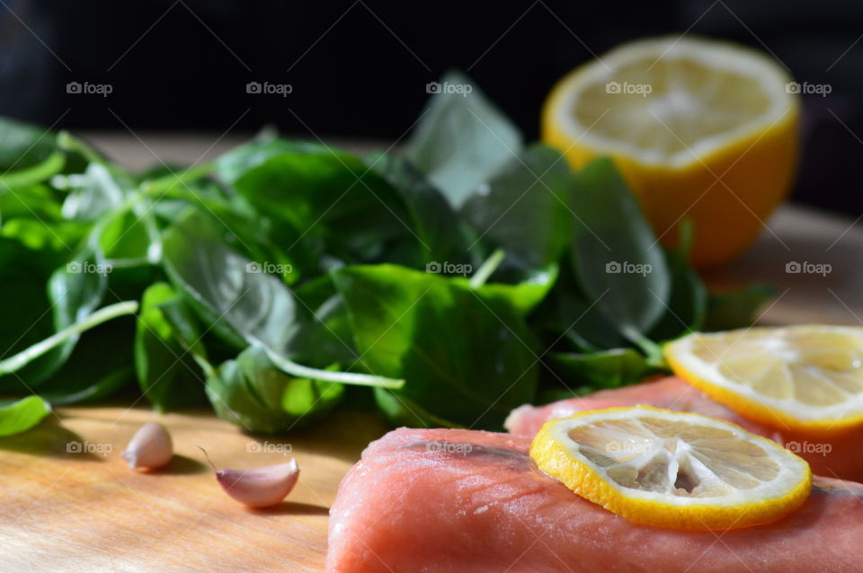 Ingredients for a delicious dinner of salmon and spinach