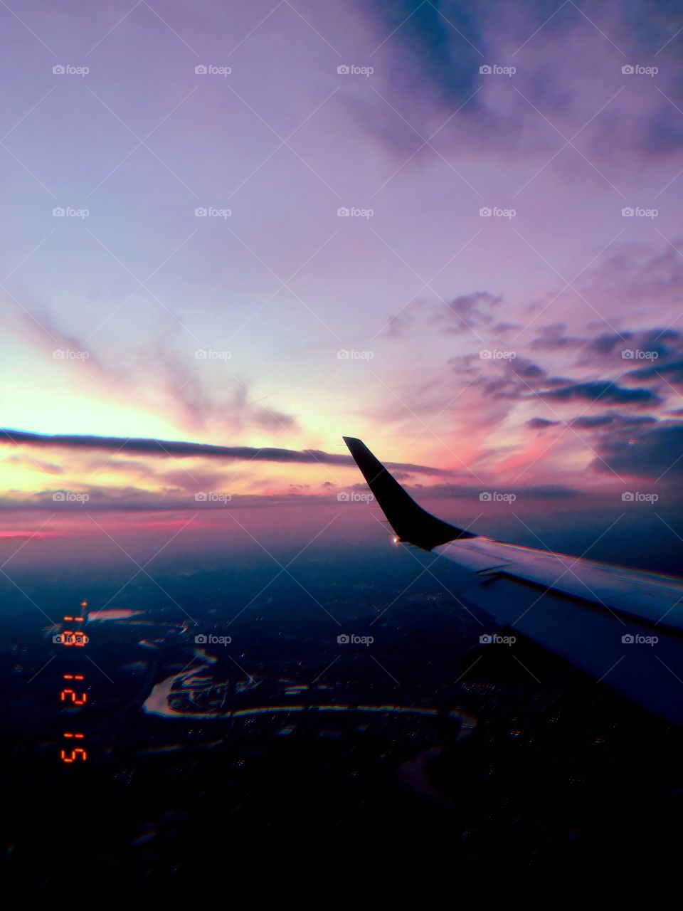 sunset through a plane window