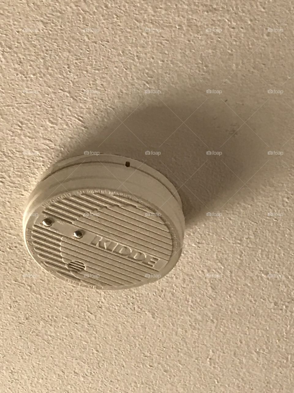 An in-home smoke detector alarm.