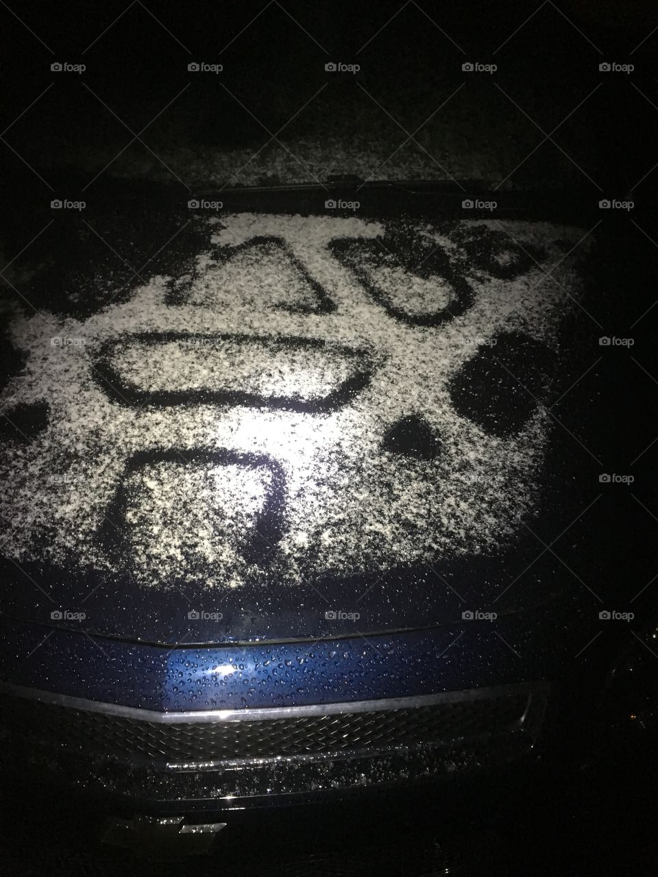 Design left on car by snow