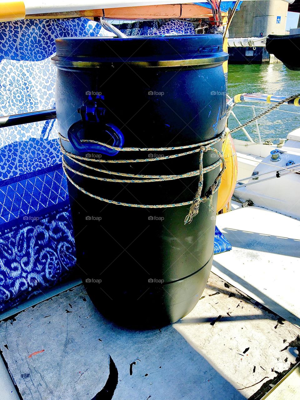 A 25 gallon drum that holds the shower water aboard our boat, the “Salvation” we use to wash ourselves with all year round. A hot water heater makes this doable and also enjoyable. 2021. Hypnotic Productions