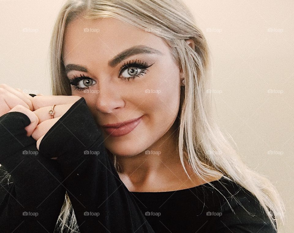 Blonde girl selfie with light makeup