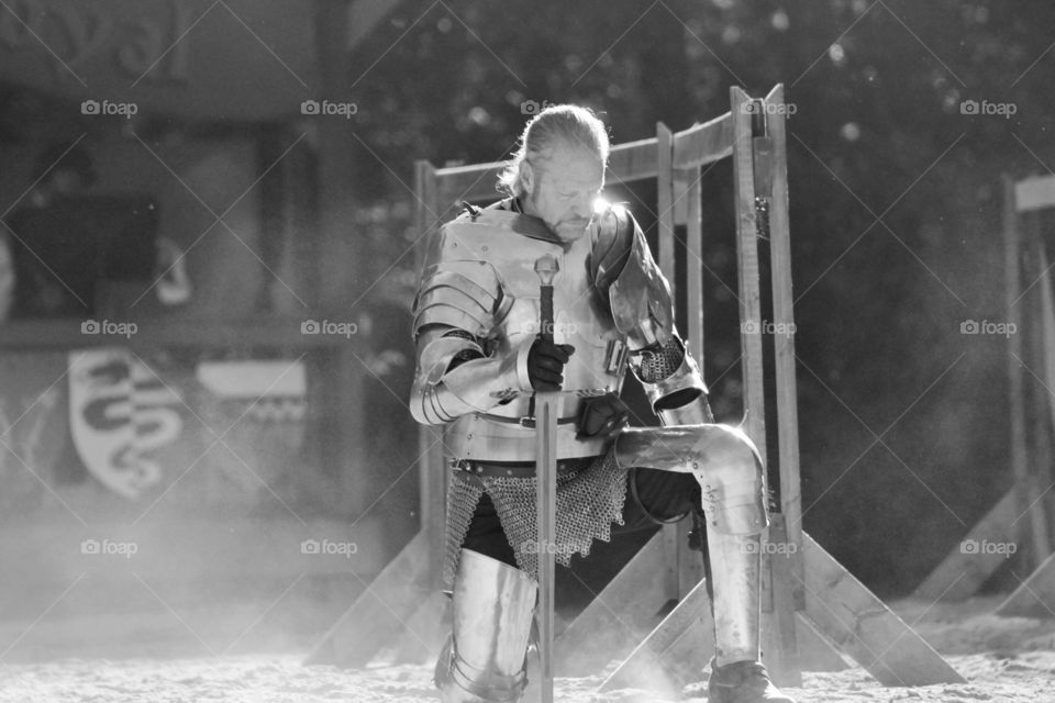 Man in armor with sword in hand