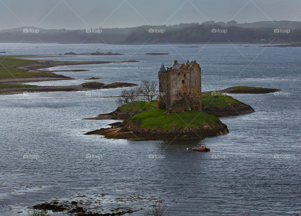 Castle Stalker. In the Scottish Highlands, also known as Castle Aaargh in Monty Python and the Holy Grail