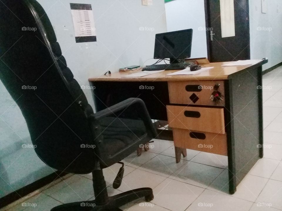 work desk.consists of desk,computer,chairs and work files