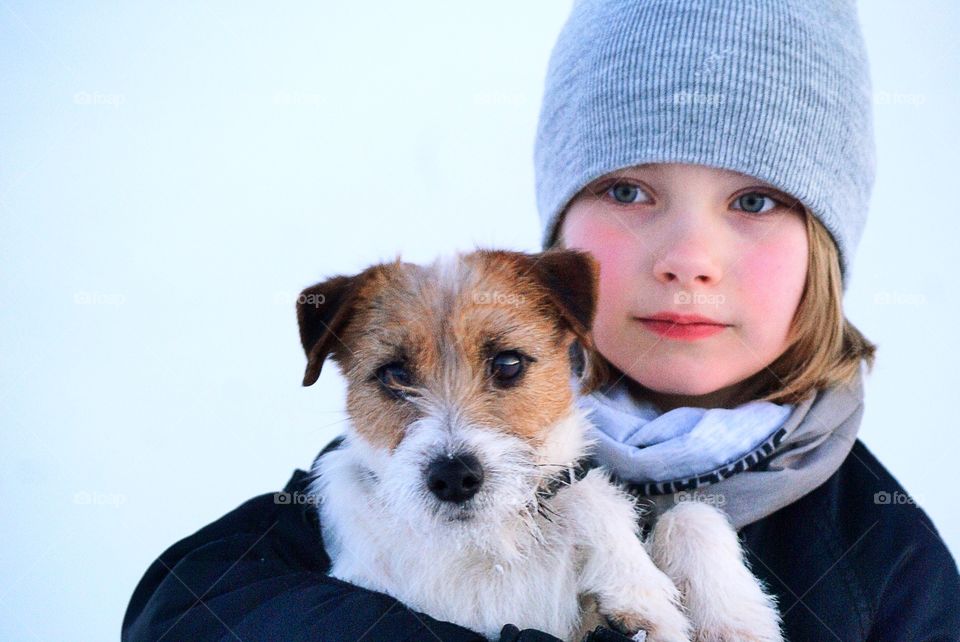 Portrait of girl with dog