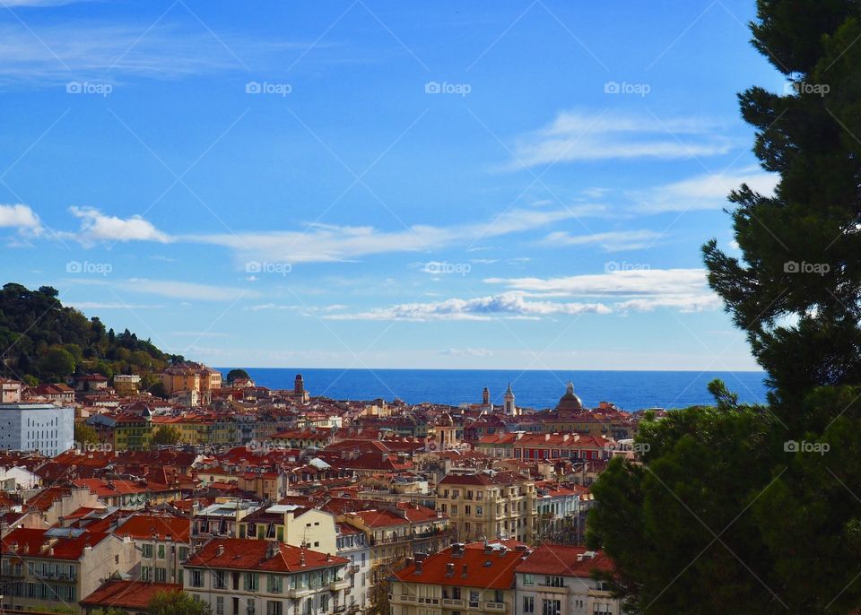 Scenic view of the rooftops of the old town and the sea from the hills of Cimiez in Nice, France.