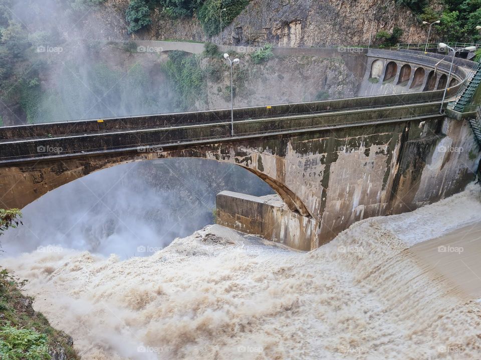 fury of the dam water and rising water vapor