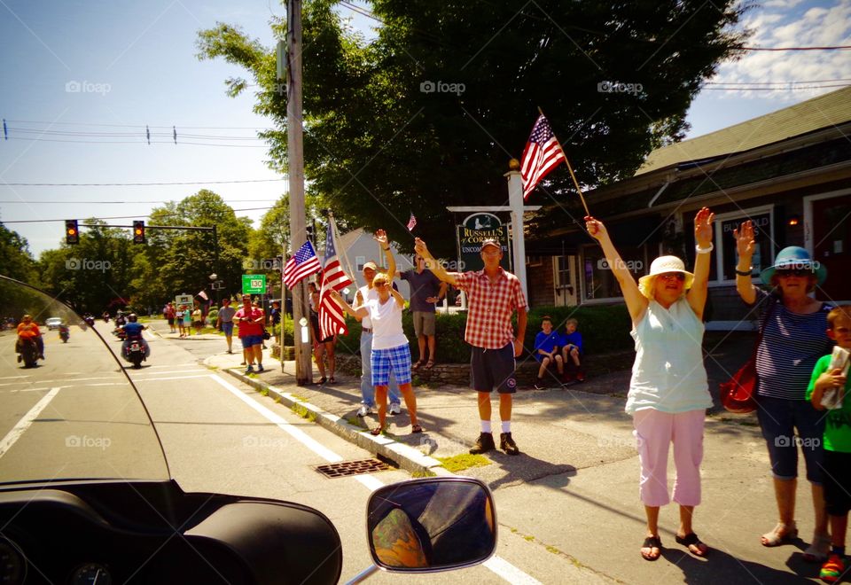 People Cheering Us Onward. Streets were lined with locals cheering riders on, thanking us for what we did by holding the Fallen Hero Ride.