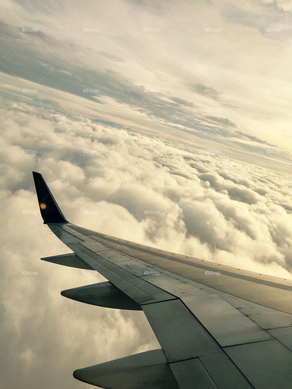 Flying east to west in the clouds
