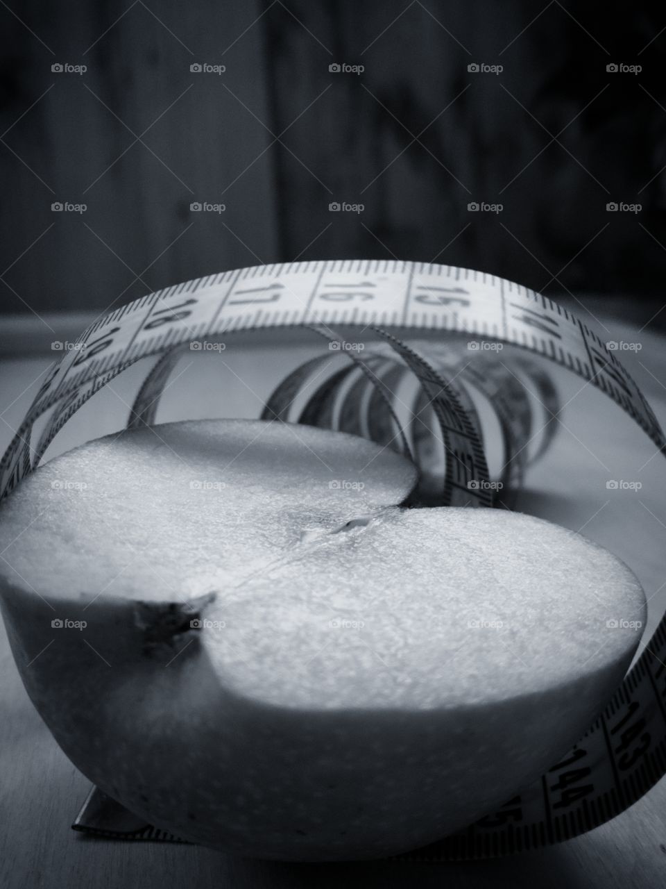 Half apple and centimeters tape