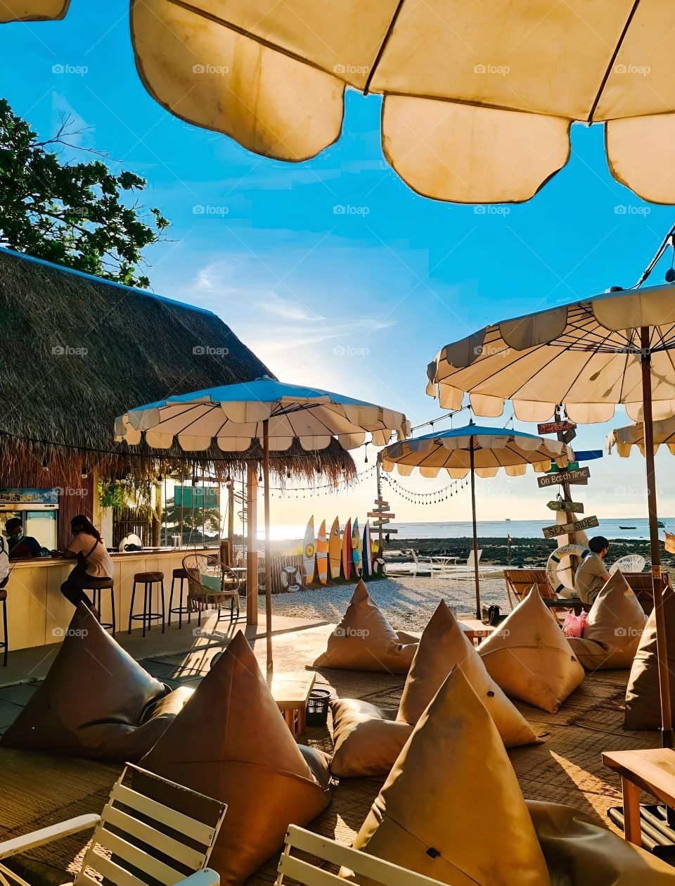 sitting pillow at the beach sunset