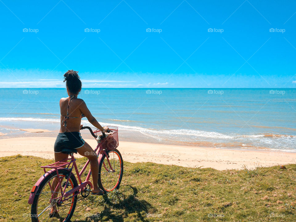 Enjoy the summer on a beautiful day to ride a bike beside this beautiful sea and under this beautiful sky