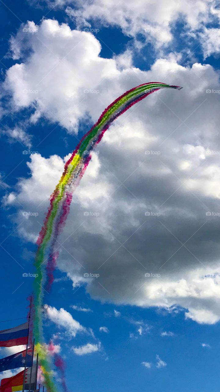 Air show. In the sky pilots from the United Arab Emirates. Flags of Russia and the United Arab Emirates. That's very beautiful.