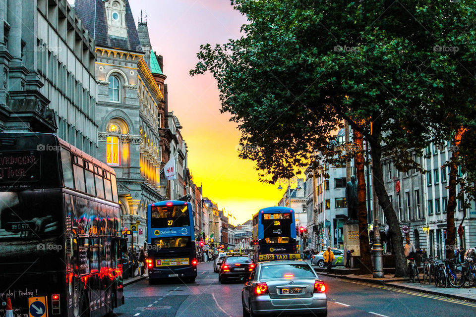 Sunset in the College Green.. Traffic and lights in the sunset. 