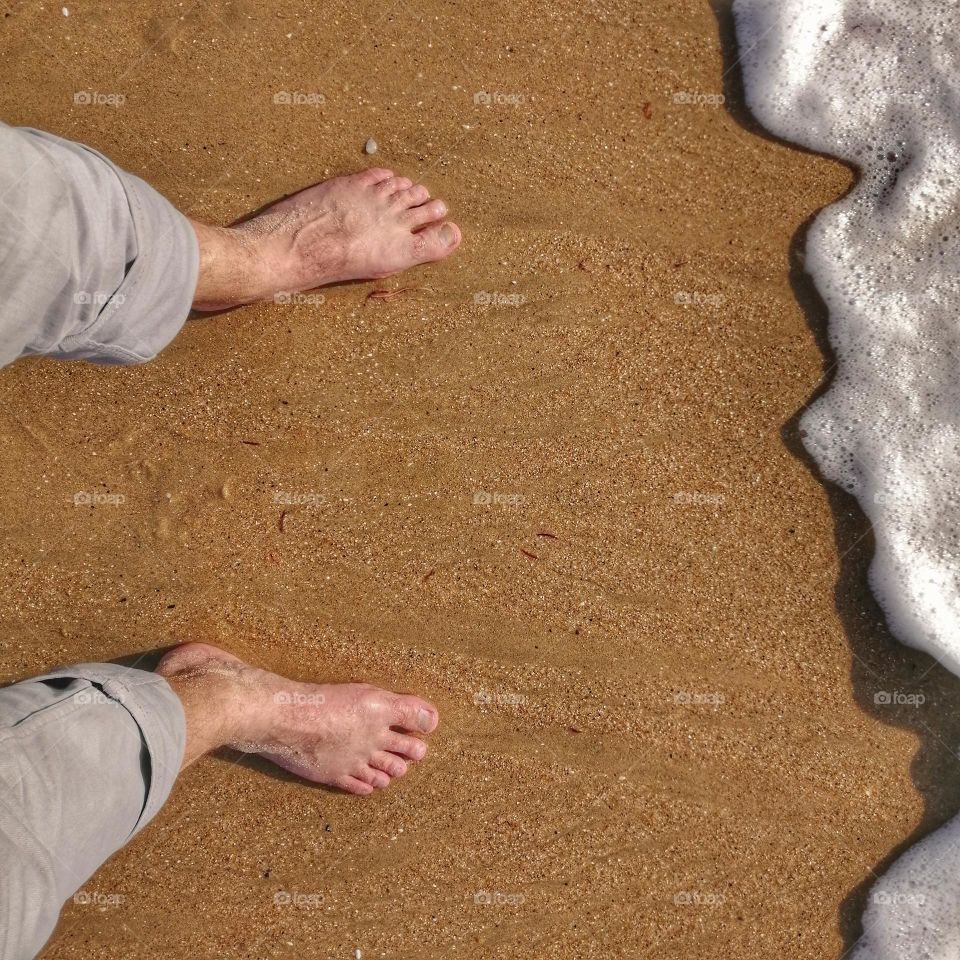 Feet in the sand