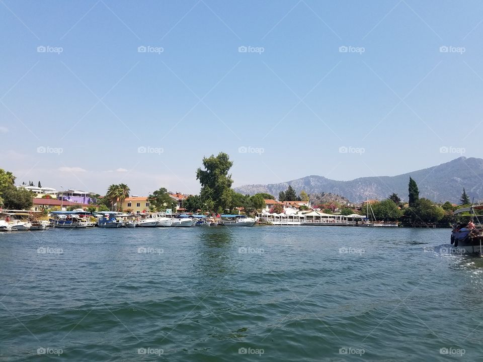 a small seaside town,  taken from a boat tour near fethiye turkey