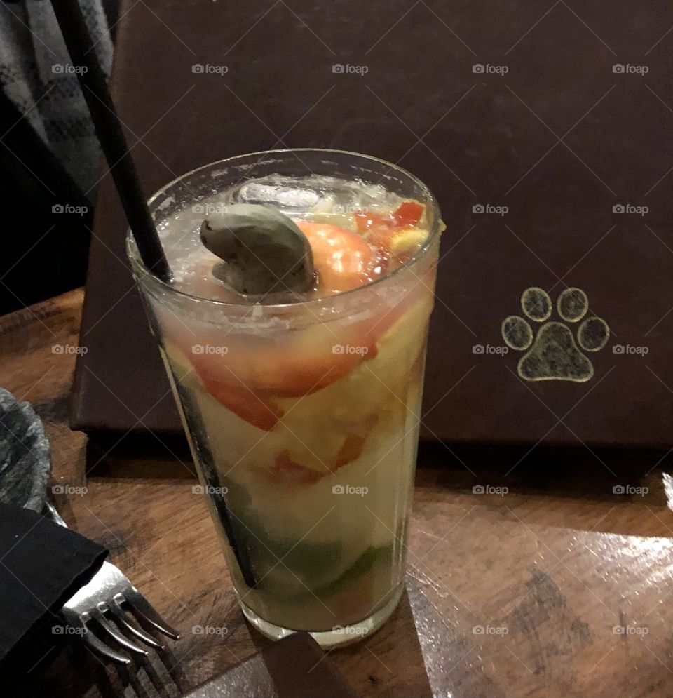 Cashew fruit in a Brazilian caipirinha drink