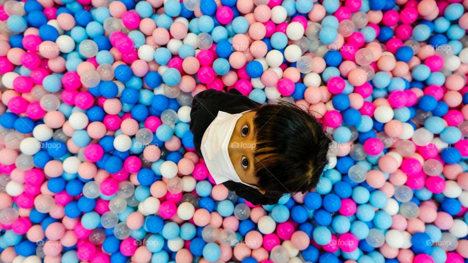 playing colorful balls on the playground