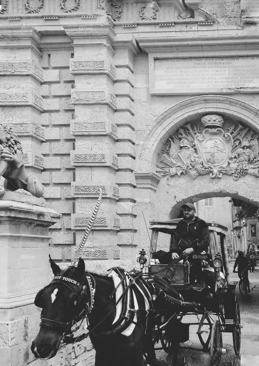 Tha man with the carriages