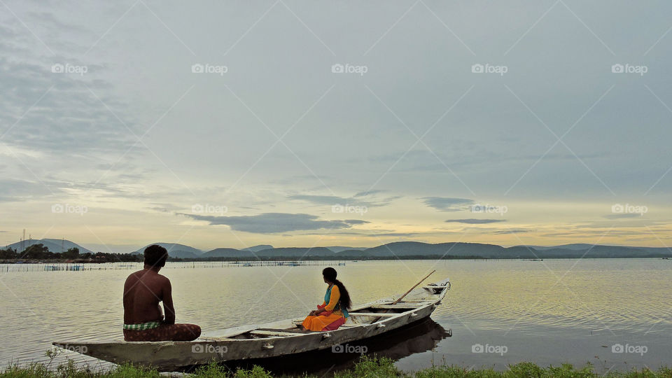 spending time in a lake during sunset