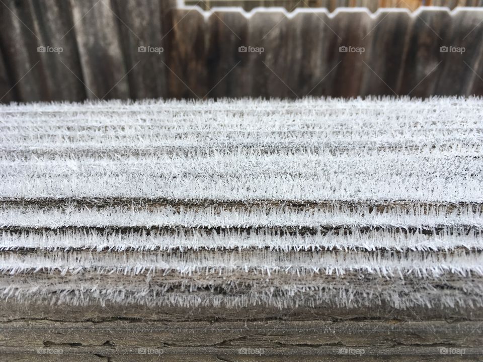 Frost on fence rail