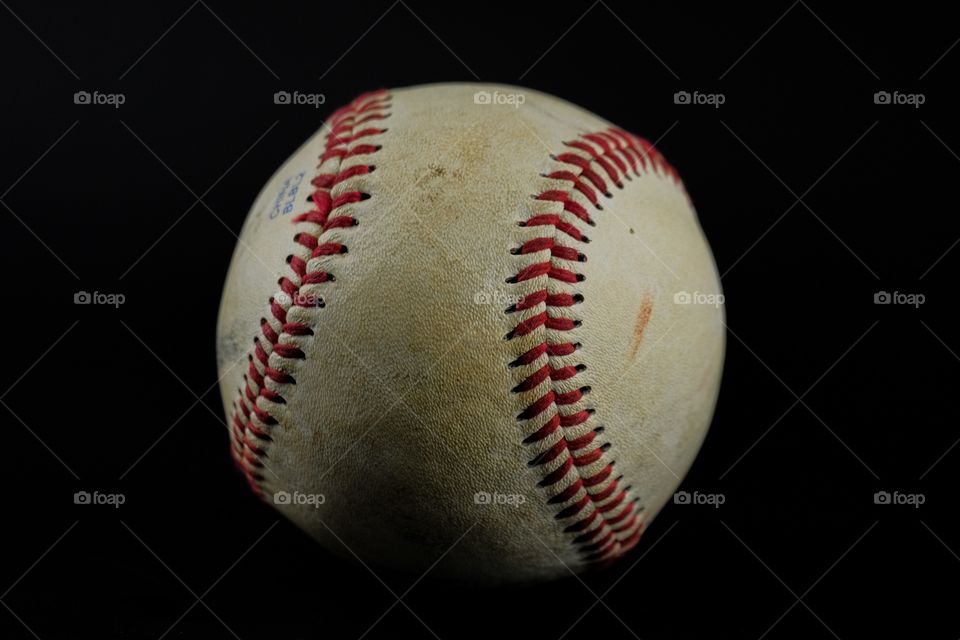 Baseball on the black background