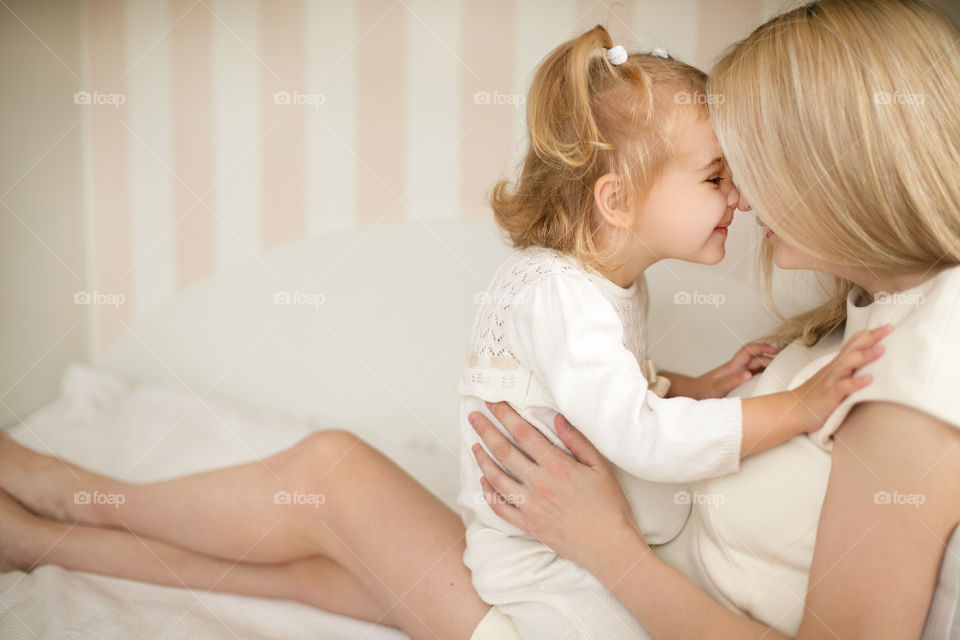 Mom with cute daughter 
