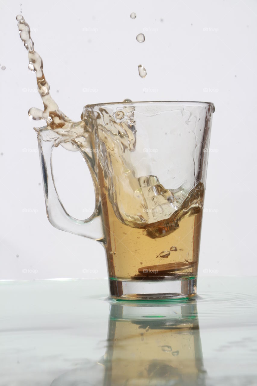 splash 
splash of liquid from a glass.