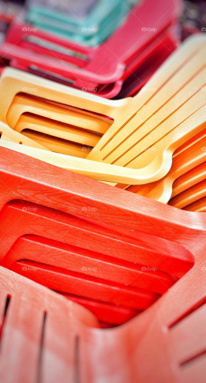 Colorful Stacked Adirondack Chairs