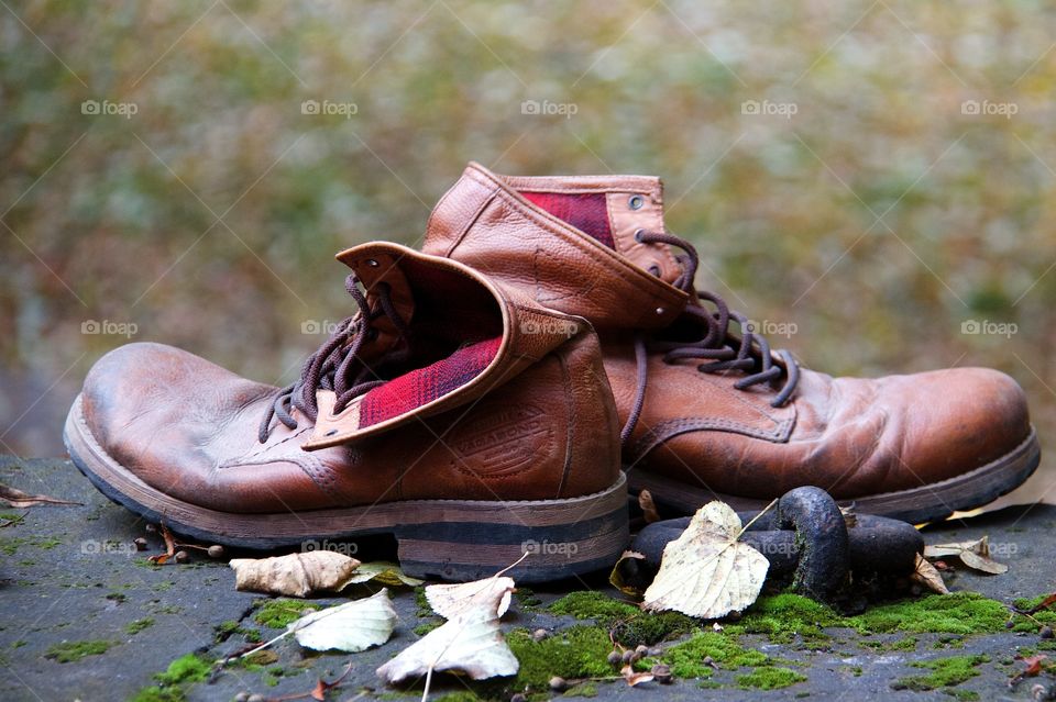 Boots and autumn background