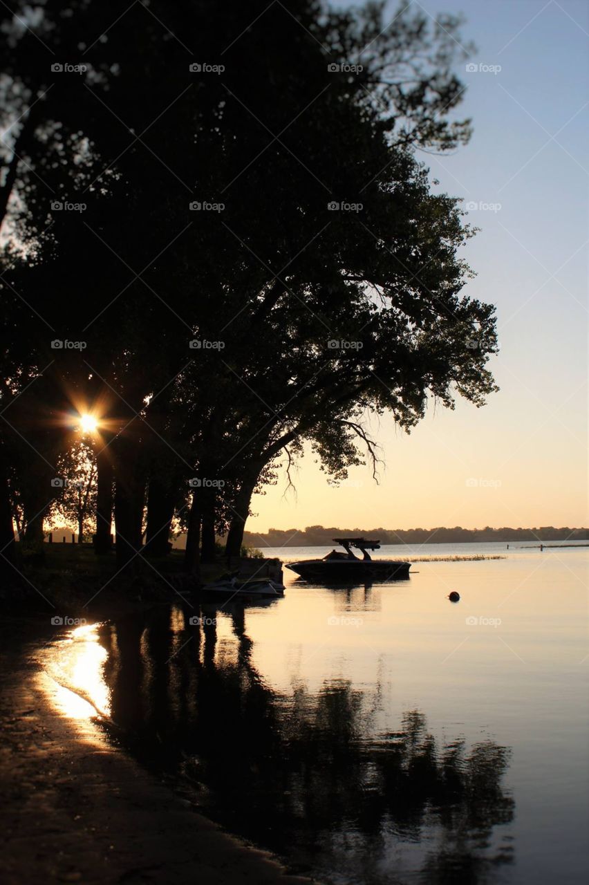 Sun rays casting the lake 