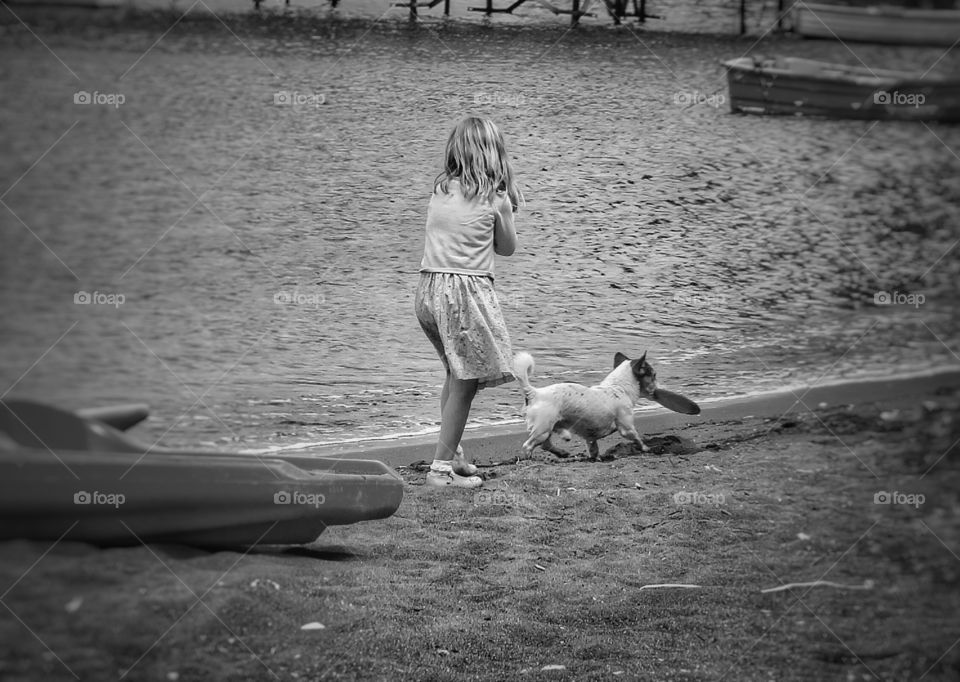 A girl, her dog and a Frisbee Sorrento